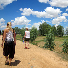 Cambodia volunteers walking on dirt road
